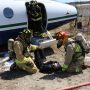 Mise en scène de l'avion qui s'est crashé avec une blessée aidé par des pompier.